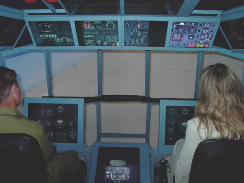 TRANZAS' flight simulator: equipped of LCD 'active touch' control panels and panoramic projection system outside cockpit. It also simulates all the vibrations and sounds. I had checking it up. Very impressive!